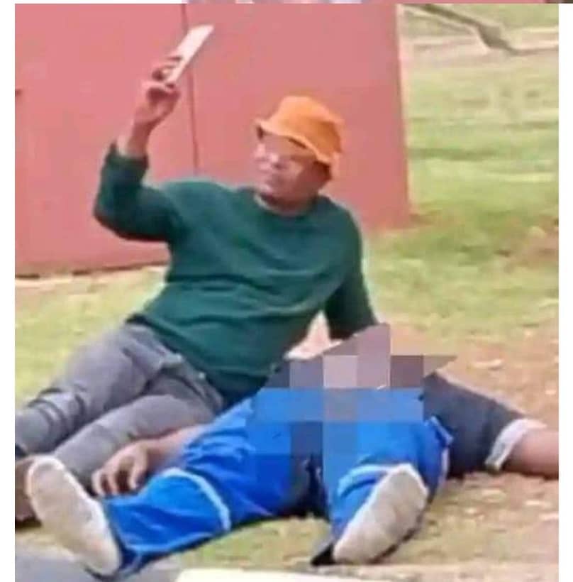 South African man seen taking a selfie after brutally murder his colleague